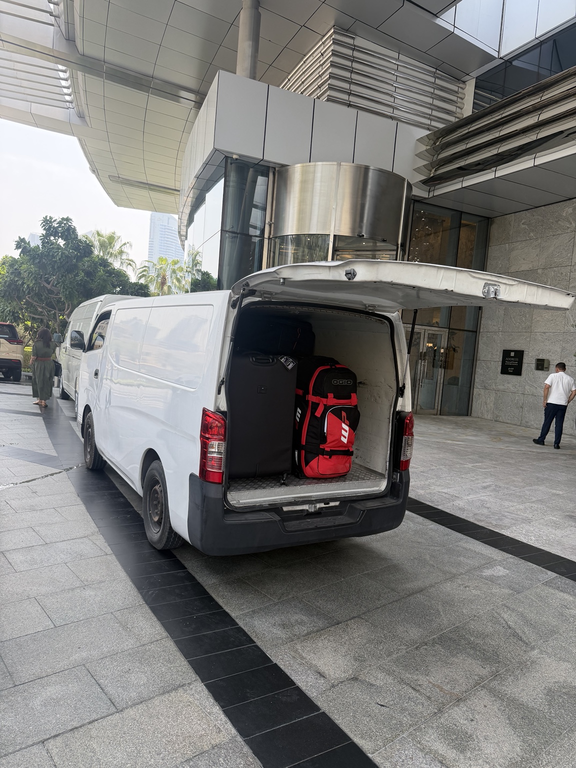 Real luggage delivery van at a Dubai hotel with bags loaded